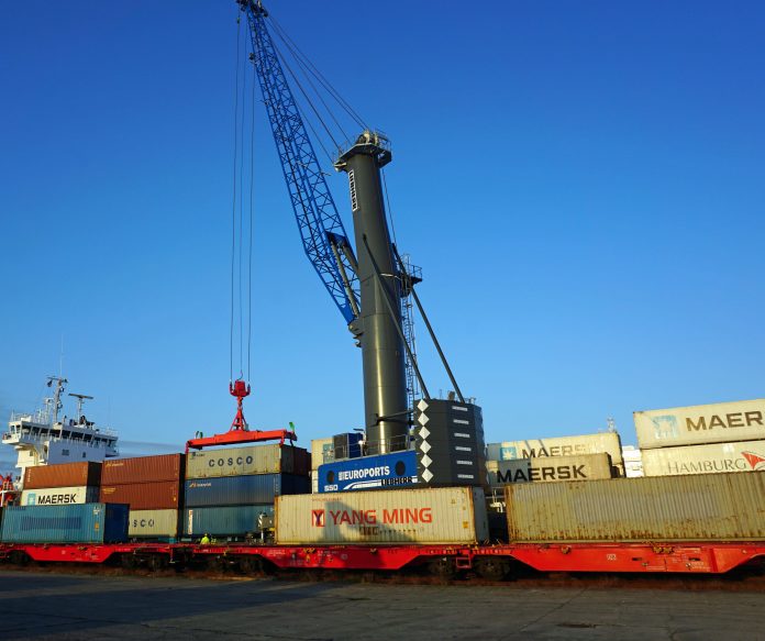 liebherr-lhm-550-euroports-rostock-germany-press-release The first containers of the New Silk Road have been loaded in the Port of Rostock. EUROPORTS Germany used their recently acquired Liebherr LHM 550 mobil